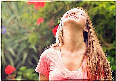 Woman bending her head backwards