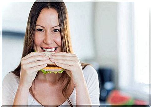 A woman eats a healthy breakfast