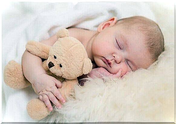 Baby with teddy bear