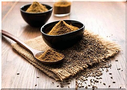 A bowl of cumin and seeds