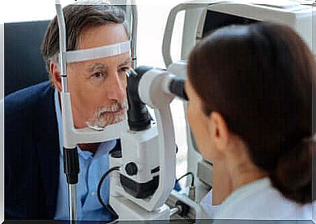 Man being checked for change in eye color