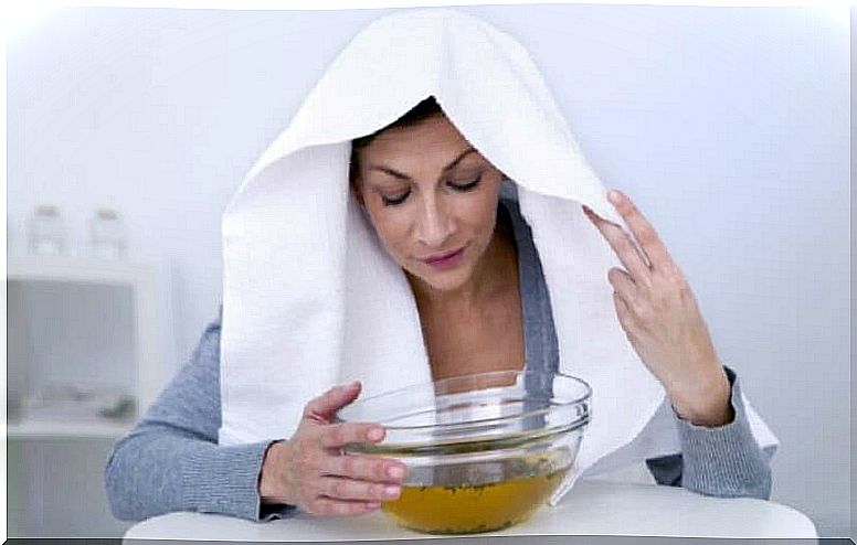 Woman sitting with a bowl of water