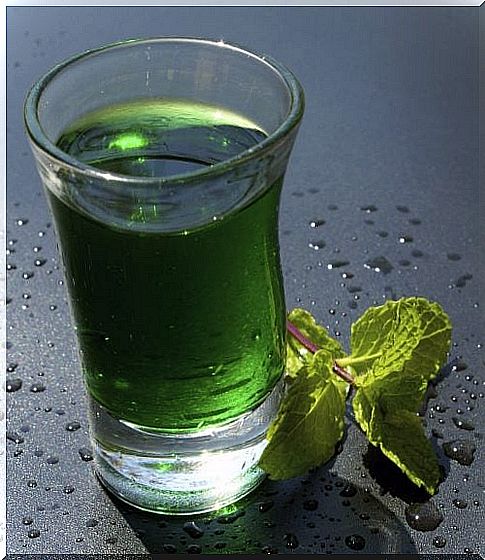 Glass of green water