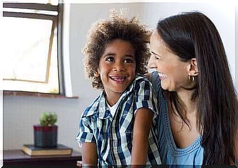 Mother and child laughing together