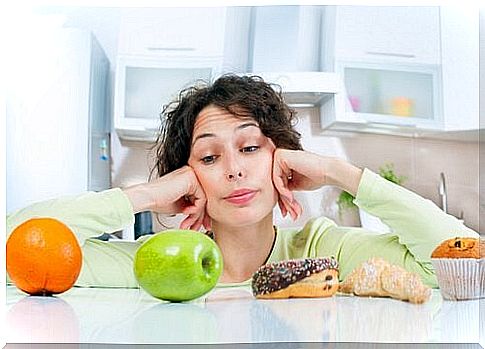 Woman staring at different foods