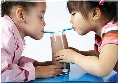 Girls drinking chocolate smoothie