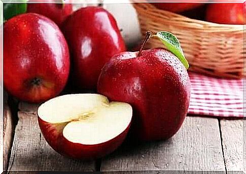 Red apples on table