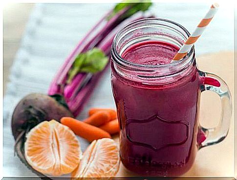 Beetroot juice with straws in