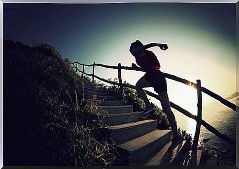 Woman running up stairs - tone your legs