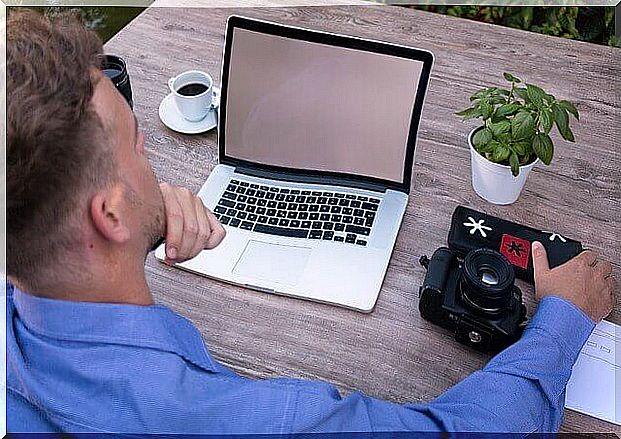 Man sitting with laptop